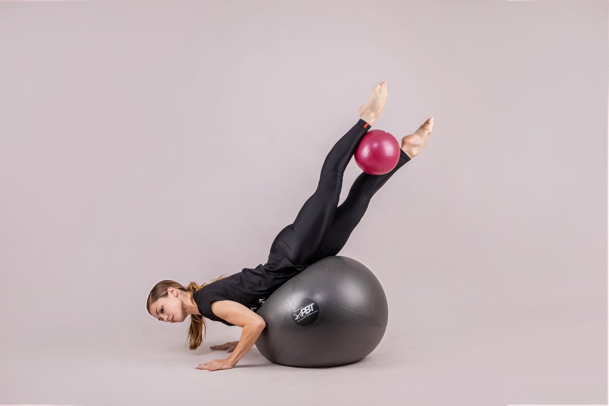 Ballet conditioning routine using PBT ball in home studio